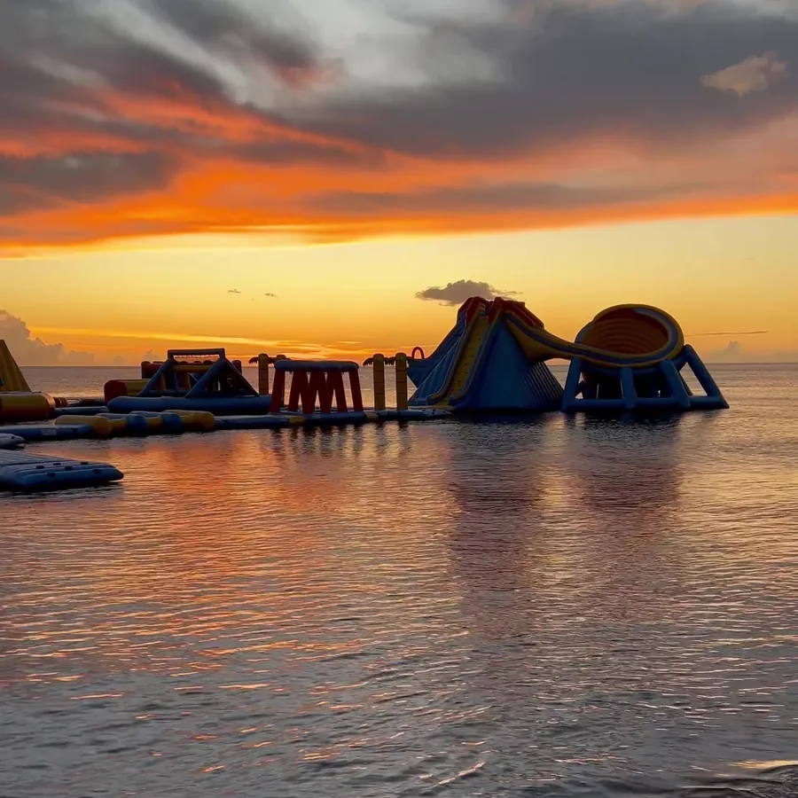 Sunset behind the water park inflatables